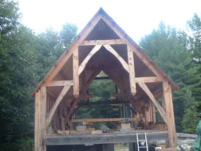 Cabinet shop hammer beam truss gable bent
This shot shows the cabinet shop with the gable bent being a hammer beam truss.
